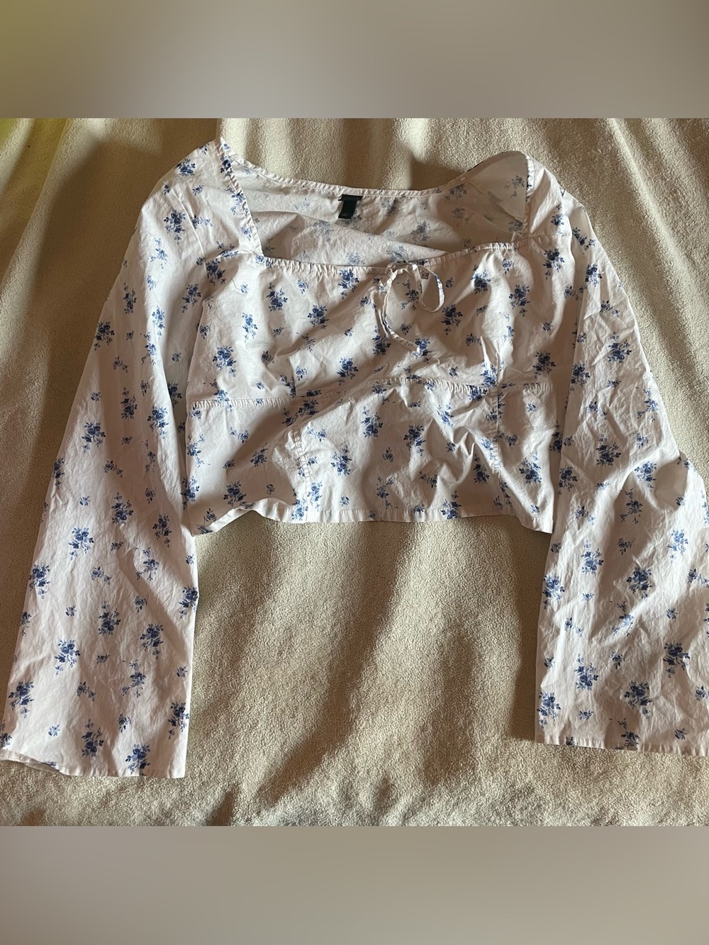 white wild fable top with floral